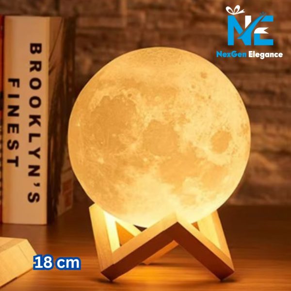 18 cm 3D moon light galaxy lamp on a wooden surface with book backdrop and NexGen Elegance branding