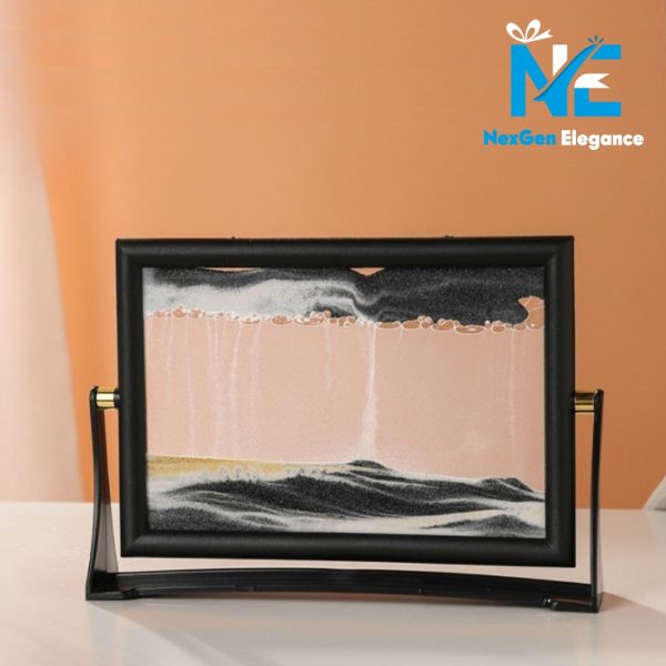 Coffee-colored sand motion display in black rectangular frame with rotating dynamic sand patterns