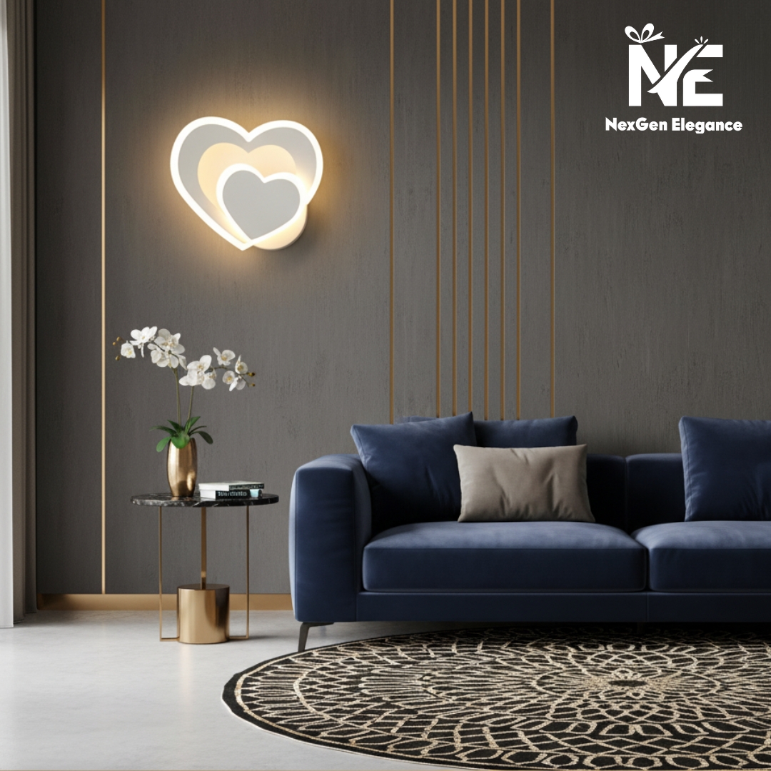 Heart Shape Wall Lamp glowing above a deep blue velvet sofa with gray and beige cushions, gold-accented side table, and patterned rug.
