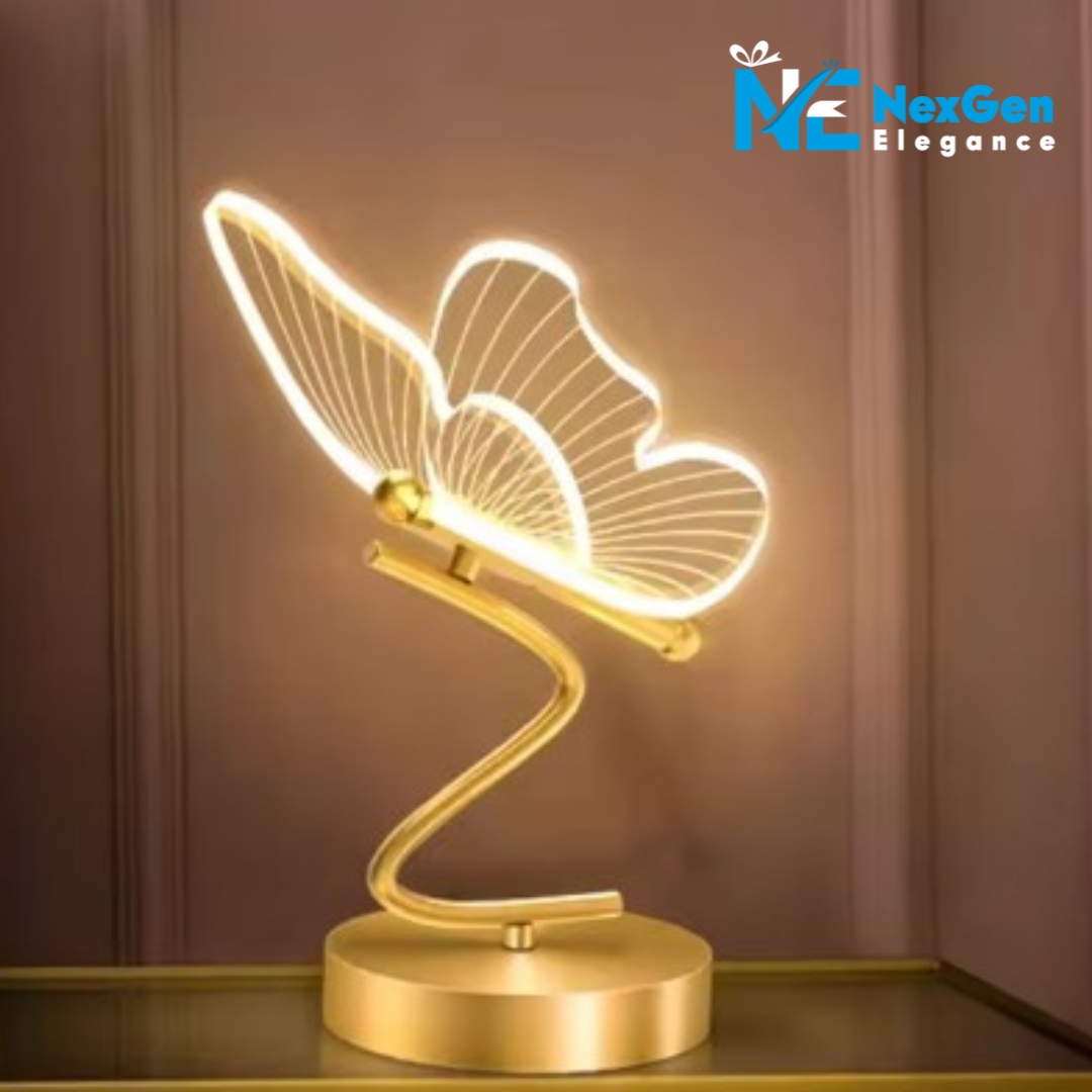 Radiant Nordic Elegant Butterfly Lamp on polished surface with warm glowing wings and curved golden stand, NexGen Elegance logo top right