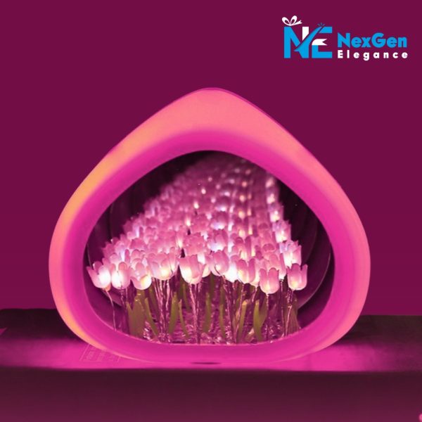 Purple droplet-shaped Love Tulip Night Light with glowing pink and white tulip LEDs inside. Heart-shaped design creates a warm, romantic glow. Perfect for bedroom décor or gifting.