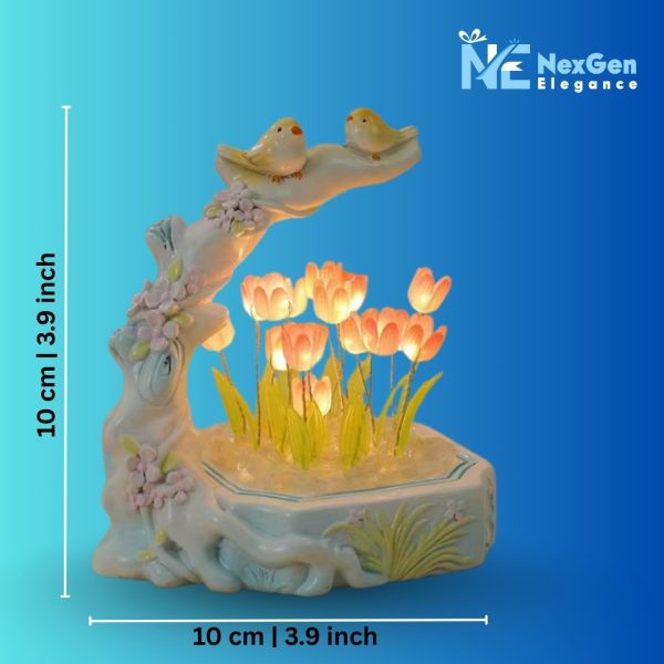 Ceramic LED night light with birds and orange tulip flowers, showing product dimensions 10cm × 10cm, compact decorative lamp